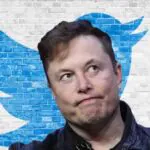 Elon Musk: receita de publicidade do Twitter cai 50% e fluxo de caixa é negativo elon musk pensativo e twitter ao fundo